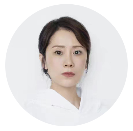 A photo of Hai Qing, a well know Chinese actress and National UN Women Ambassador for China. She is looking at the camera with a white shirt and white background.